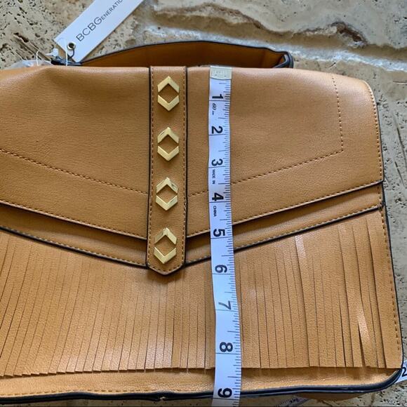 NEW BCBGeneration Dylan messenger bag mustard yellow medium tan fringe detail - Picture 11 of 12